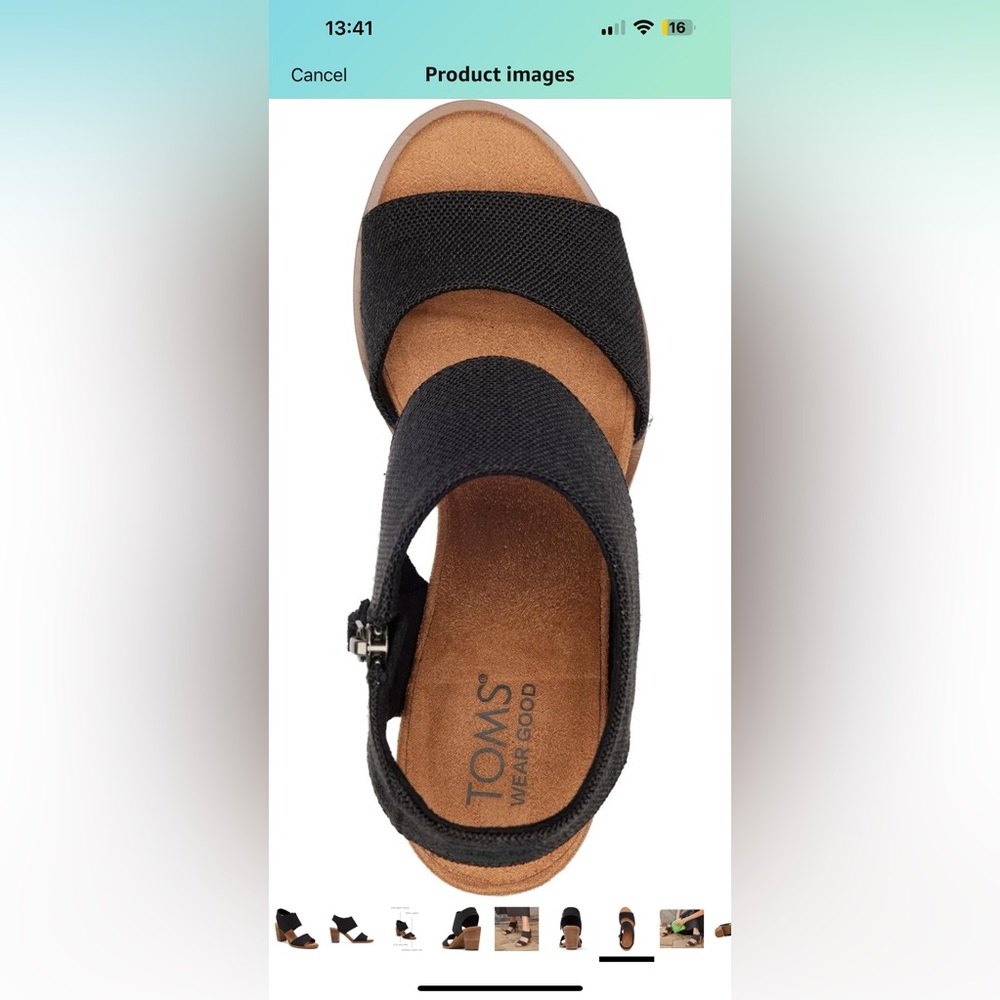 Brand new. TOMS Black and Tan Sandals.